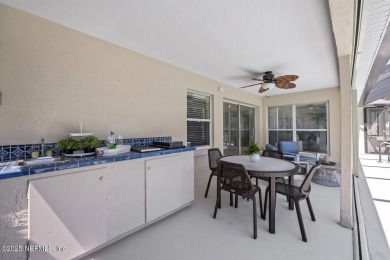 The great room beckons with a view overlooking a 12' x 35' on Grand Haven Golf Club in Florida - for sale on GolfHomes.com, golf home, golf lot