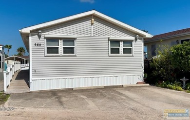 Vacation home or turn-key rental for investors, this waterfront on Long Island Golf Course in Texas - for sale on GolfHomes.com, golf home, golf lot