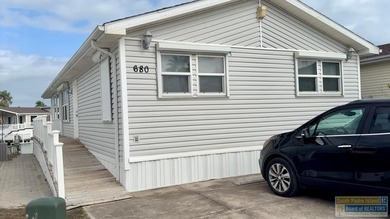 Vacation home or turn-key rental for investors, this waterfront on Long Island Golf Course in Texas - for sale on GolfHomes.com, golf home, golf lot