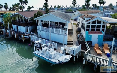 Vacation home or turn-key rental for investors, this waterfront on Long Island Golf Course in Texas - for sale on GolfHomes.com, golf home, golf lot