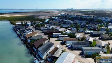 Vacation home or turn-key rental for investors, this waterfront on Long Island Golf Course in Texas - for sale on GolfHomes.com, golf home, golf lot