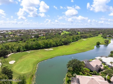 The great room beckons with a view overlooking a 12' x 35' on Grand Haven Golf Club in Florida - for sale on GolfHomes.com, golf home, golf lot
