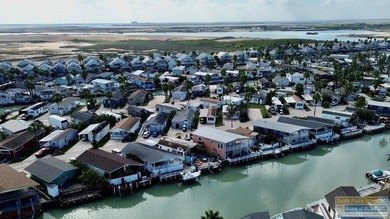 Vacation home or turn-key rental for investors, this waterfront on Long Island Golf Course in Texas - for sale on GolfHomes.com, golf home, golf lot