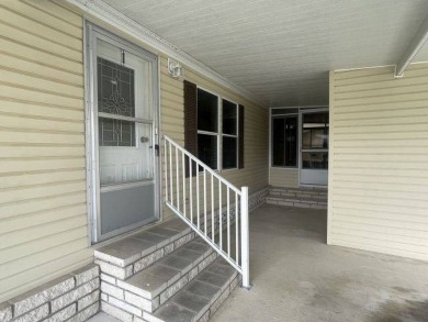 GREAT BUY ~ SAVE $10,000! Welcome "home" to this on Four Lakes Golf Club in Florida - for sale on GolfHomes.com, golf home, golf lot
