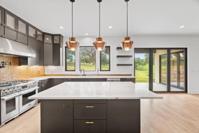 Stylish Hill Country contemporary home backing up to the #1 tee on Apple Rock Golf Course - Horseshoe Bay in Texas - for sale on GolfHomes.com, golf home, golf lot