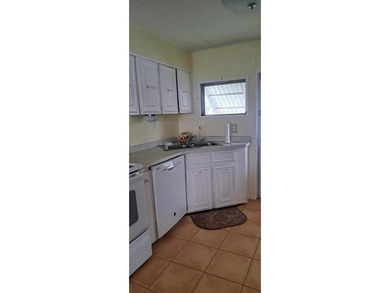 Double wide manufactured home with separate shed. Financing on Spanish Lakes I in Florida - for sale on GolfHomes.com, golf home, golf lot