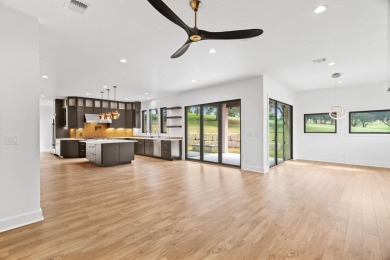 Stylish Hill Country contemporary home backing up to the #1 tee on Apple Rock Golf Course - Horseshoe Bay in Texas - for sale on GolfHomes.com, golf home, golf lot