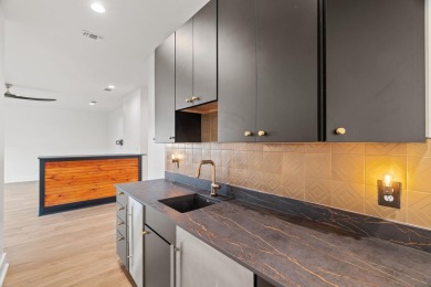 Stylish Hill Country contemporary home backing up to the #1 tee on Apple Rock Golf Course - Horseshoe Bay in Texas - for sale on GolfHomes.com, golf home, golf lot