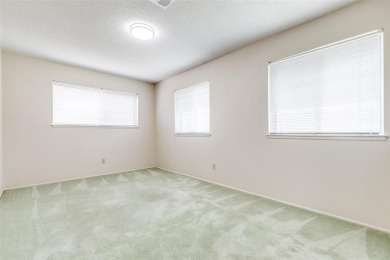 Welcome home to this golf course gem with a fabulous sunroom on Brookhaven Country Club - Golf Course in Texas - for sale on GolfHomes.com, golf home, golf lot
