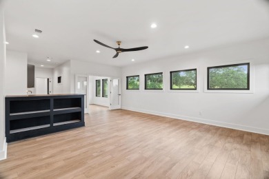 Stylish Hill Country contemporary home backing up to the #1 tee on Apple Rock Golf Course - Horseshoe Bay in Texas - for sale on GolfHomes.com, golf home, golf lot