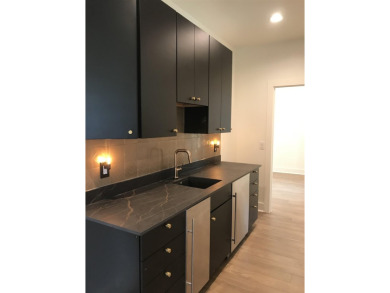 Stylish Hill Country contemporary home backing up to the #1 tee on Apple Rock Golf Course - Horseshoe Bay in Texas - for sale on GolfHomes.com, golf home, golf lot