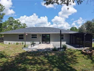 Unlock the potential in this nearly finished 4-bedroom, 2.5-bath on Citrus Springs Country Club in Florida - for sale on GolfHomes.com, golf home, golf lot