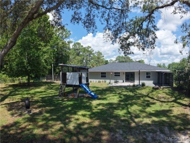 Unlock the potential in this nearly finished 4-bedroom, 2.5-bath on Citrus Springs Country Club in Florida - for sale on GolfHomes.com, golf home, golf lot