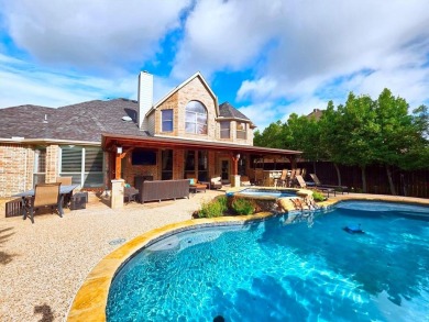 Stunning 5-Bedroom Home with Outdoor Oasis in the Heart of on Coyote Ridge Golf Club in Texas - for sale on GolfHomes.com, golf home, golf lot
