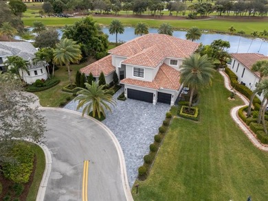 Model-perfect 5 bedroom, 4.5 bathroom w captivating views of the on Parkland Golf Club in Florida - for sale on GolfHomes.com, golf home, golf lot