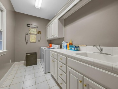 Welcome to your beautiful, all brick, traditional, executive on The Carolina Country Club in South Carolina - for sale on GolfHomes.com, golf home, golf lot