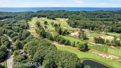 Welcome to 12604 Retreat Dr, Grand Haven! This beautifully on Grand Haven Golf Club in Michigan - for sale on GolfHomes.com, golf home, golf lot