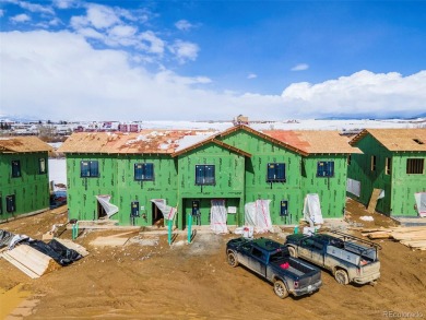 This great 2-bedroom 1.5 bath townhome is everything you need in on Headwaters Golf Course At Granby Ranch in Colorado - for sale on GolfHomes.com, golf home, golf lot