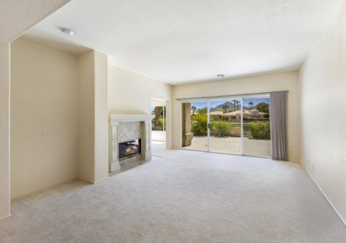 The home is located in the Guard Gated Lake community of Laguna on La Quinta Golf  Resort and Country Clubs in California - for sale on GolfHomes.com, golf home, golf lot