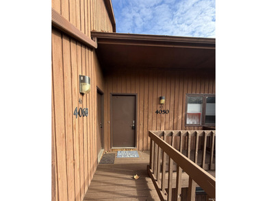 This inviting Lake Monroe condo features soaring ceilings and on The Eagle Pointe Golf Resort in Indiana - for sale on GolfHomes.com, golf home, golf lot