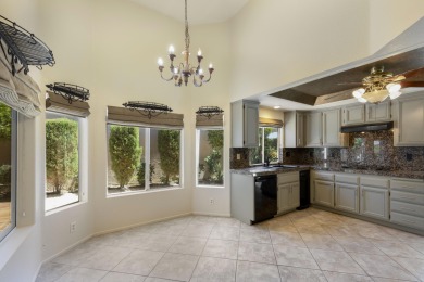 The home is located in the Guard Gated Lake community of Laguna on La Quinta Golf  Resort and Country Clubs in California - for sale on GolfHomes.com, golf home, golf lot