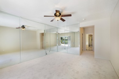 The home is located in the Guard Gated Lake community of Laguna on La Quinta Golf  Resort and Country Clubs in California - for sale on GolfHomes.com, golf home, golf lot