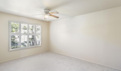 The home is located in the Guard Gated Lake community of Laguna on La Quinta Golf  Resort and Country Clubs in California - for sale on GolfHomes.com, golf home, golf lot