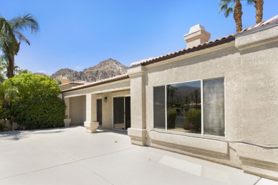The home is located in the Guard Gated Lake community of Laguna on La Quinta Golf  Resort and Country Clubs in California - for sale on GolfHomes.com, golf home, golf lot