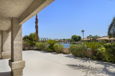 The home is located in the Guard Gated Lake community of Laguna on La Quinta Golf  Resort and Country Clubs in California - for sale on GolfHomes.com, golf home, golf lot