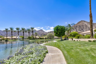 The home is located in the Guard Gated Lake community of Laguna on La Quinta Golf  Resort and Country Clubs in California - for sale on GolfHomes.com, golf home, golf lot