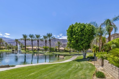 The home is located in the Guard Gated Lake community of Laguna on La Quinta Golf  Resort and Country Clubs in California - for sale on GolfHomes.com, golf home, golf lot