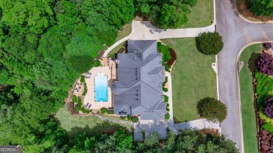 Imagine embracing summer mornings on your private deck, coffee on Canongate At Flat Creek Club in Georgia - for sale on GolfHomes.com, golf home, golf lot