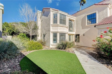 This 2-story home is located in Painted Desert, a guard-gated on Painted Desert Golf Club in Nevada - for sale on GolfHomes.com, golf home, golf lot