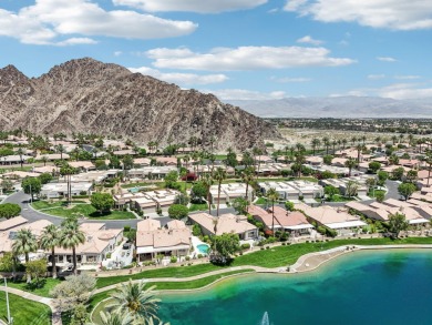 The home is located in the Guard Gated Lake community of Laguna on La Quinta Golf  Resort and Country Clubs in California - for sale on GolfHomes.com, golf home, golf lot