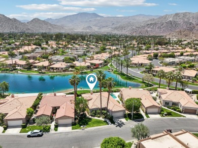 The home is located in the Guard Gated Lake community of Laguna on La Quinta Golf  Resort and Country Clubs in California - for sale on GolfHomes.com, golf home, golf lot