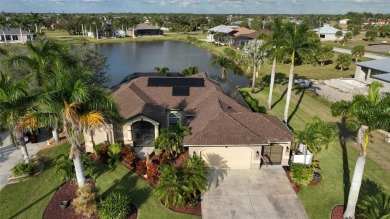 This impeccably maintained and beautifully designed waterfront on Burnt Store Golf Club in Florida - for sale on GolfHomes.com, golf home, golf lot