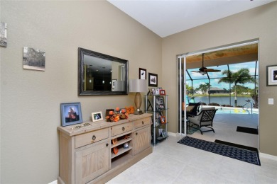 This impeccably maintained and beautifully designed waterfront on Burnt Store Golf Club in Florida - for sale on GolfHomes.com, golf home, golf lot