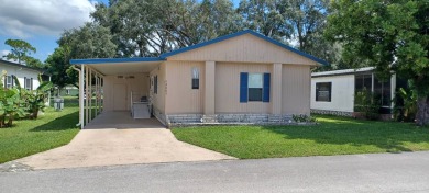 Come settle down and relax in a beautiful, manufactured home on Fairways Country Club in Florida - for sale on GolfHomes.com, golf home, golf lot