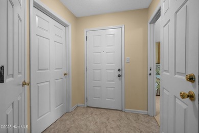 Discover easy coastal living in this desirable 2-bedroom, 2-bath on Oyster Bay Golf Links in North Carolina - for sale on GolfHomes.com, golf home, golf lot