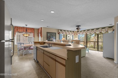 Discover easy coastal living in this desirable 2-bedroom, 2-bath on Oyster Bay Golf Links in North Carolina - for sale on GolfHomes.com, golf home, golf lot