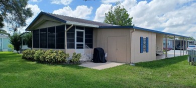 Come settle down and relax in a beautiful, manufactured home on Fairways Country Club in Florida - for sale on GolfHomes.com, golf home, golf lot