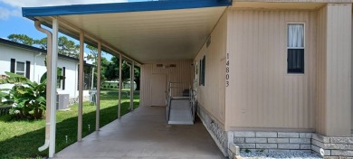 Come settle down and relax in a beautiful, manufactured home on Fairways Country Club in Florida - for sale on GolfHomes.com, golf home, golf lot