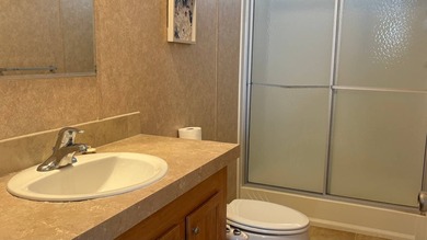 Welcome to this charming 2011 furnished 2-bedroom, 2-bathroom on Sabal Springs Golf and Racquet Club in Florida - for sale on GolfHomes.com, golf home, golf lot