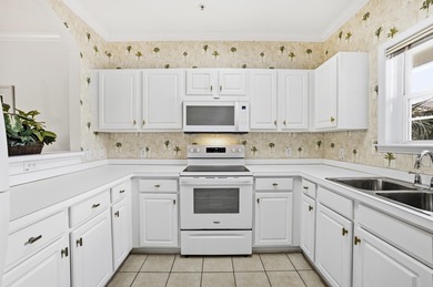 Located in Arbor Trace within the highly sought-after Barefoot on  in South Carolina - for sale on GolfHomes.com, golf home, golf lot