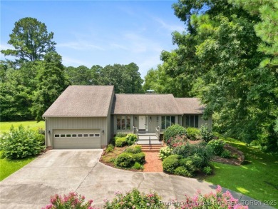 Beautiful flowing split bedroom ranch floor plan situated on the on Carolina Trace Country Club in North Carolina - for sale on GolfHomes.com, golf home, golf lot