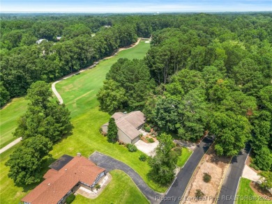 Beautiful flowing split bedroom ranch floor plan situated on the on Carolina Trace Country Club in North Carolina - for sale on GolfHomes.com, golf home, golf lot