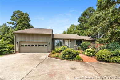 Beautiful flowing split bedroom ranch floor plan situated on the on Carolina Trace Country Club in North Carolina - for sale on GolfHomes.com, golf home, golf lot