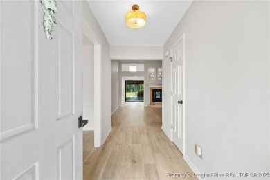Beautiful flowing split bedroom ranch floor plan situated on the on Carolina Trace Country Club in North Carolina - for sale on GolfHomes.com, golf home, golf lot
