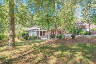 This stunning 3-bedroom, 2-bath home with a spacious flex room on The Golf Club At Cedar Creek in South Carolina - for sale on GolfHomes.com, golf home, golf lot