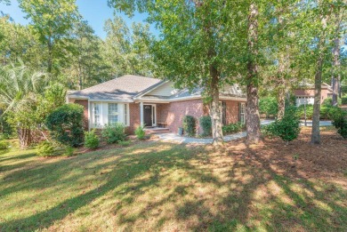 This stunning 3-bedroom, 2-bath home with a spacious flex room on The Golf Club At Cedar Creek in South Carolina - for sale on GolfHomes.com, golf home, golf lot